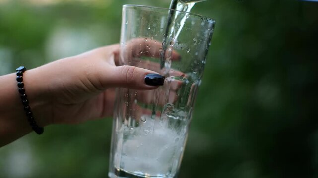 water being poured into a glass