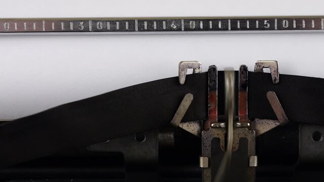 The word EMBARGO is typing on a retro typewriter.