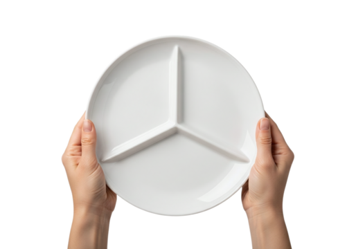 Photo of overhead shot of a person holding a clean white divided plate to promote portion control and healthy eating habits isolated on transparent background
