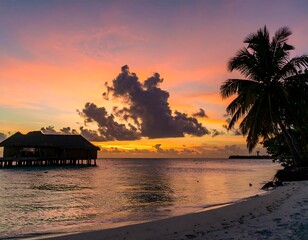 Tropical sunset over ocean resort