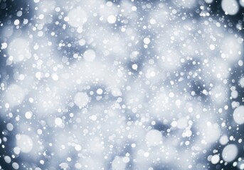 Fototapeta premium Abstract background with soft focus white snowflakes falling in a gentle winter storm, creating a magical and festive atmosphere