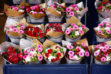 Colorful Flower Bouquets Displayed in a Retail Shop Showcasing Floral Arrangements