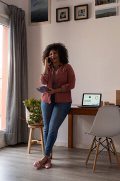 Happy client talking to customer care service via phone call