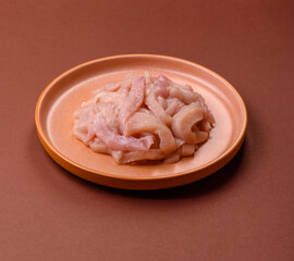 Raw chicken meat cut into strips, fresh fillet or breast slices. Chicken raw meat in pieces