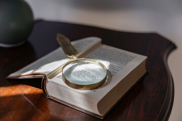 Magnifying glass on a book page