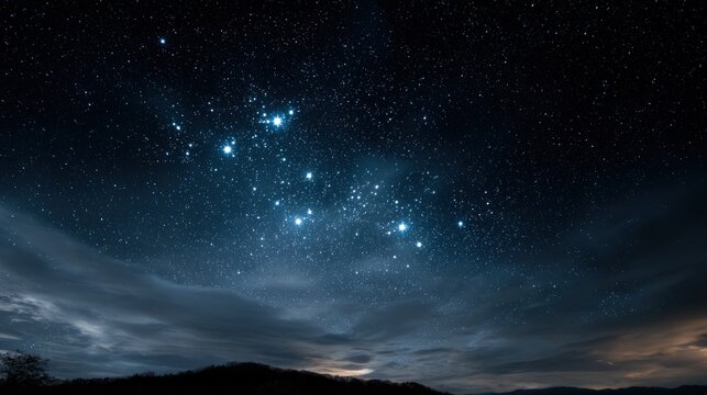 A night sky ablaze with stars and clouds.