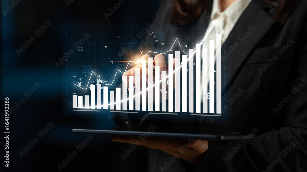 Poster a business professional examines financial data displayed as digital graphs on a tablet in a modern 