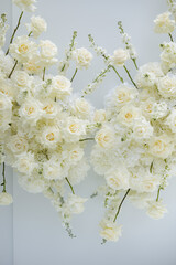 Delicate white roses cascading gracefully, creating an ethereal backdrop for a romantic atmosphere