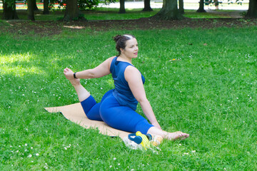 Woman and sports, exercise for stretching and weight loss in the fresh air. Happy curvy 40s woman...