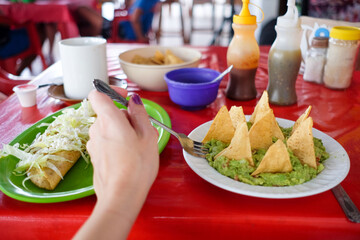 Eating Crispy Tacos and Enchiladas