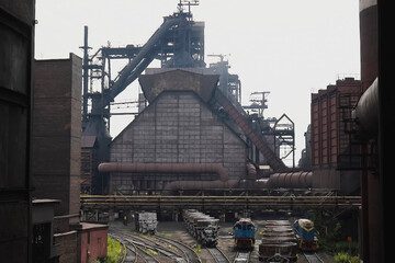 Freight trolleys on the territory of metal smelter.