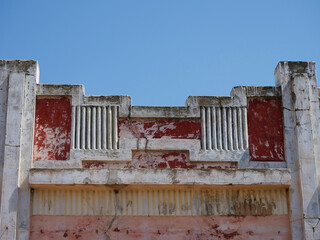 Detail of an architectural facade, older dilapidated building featuring Art Deco or modernist...