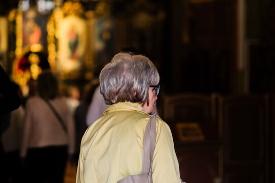 Back View of Woman in Church