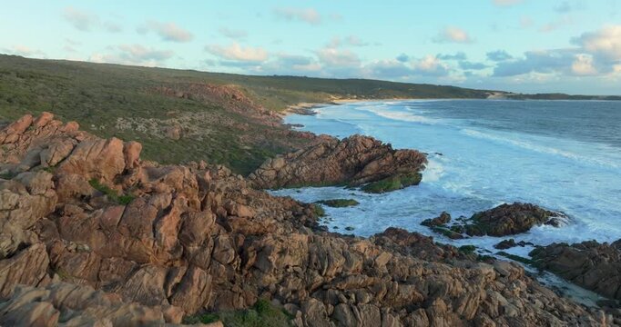 4k Aerial views of rugged rocky coastline in South West Australia at sunset
