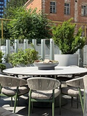 Outdoor Patio Dining Area with Modern Chairs