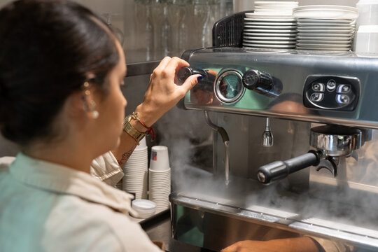 Barista using steam wand