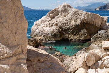 Couple enjoying swimming in sea water