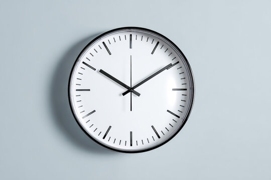 Minimalist Wall Clock Design Showing the Time with Clean White Face and Sleek Black Frame for Office or Home Decor