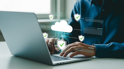 Person using laptop with cloud computing and cybersecurity icons