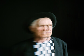 Man in hat with blur effect
