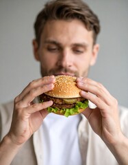 Man eating a hamburger