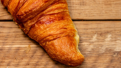 Freshly baked french croissant. Golden croissant for breakfast