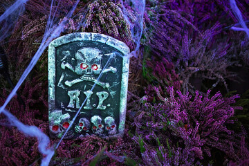 Tombstone RIP Skull and Crossbones Halloween Yard Decoration with Red Glowing Eyes