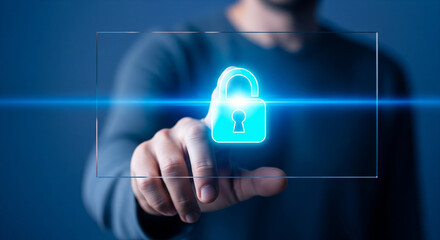A person interacts with a holographic interface displaying a glowing lock symbol, representing digital security, privacy protection, and online data encryption in a modern technological environment.

