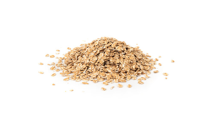 Spelt flakes isolated, dry raw rolled flat oat grains, wheat, oatmeal or bran, barley rye cereals