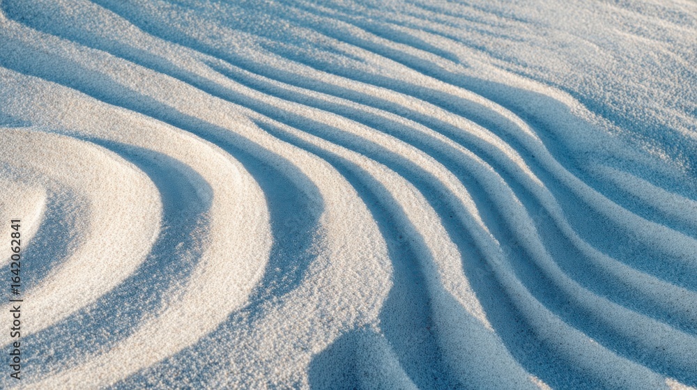 Poster fine sand forms delicate, wave-like patterns under soft light, showcasing the effects of wind and ti