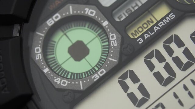 Macro close up of a tactical digital watch face functioning
