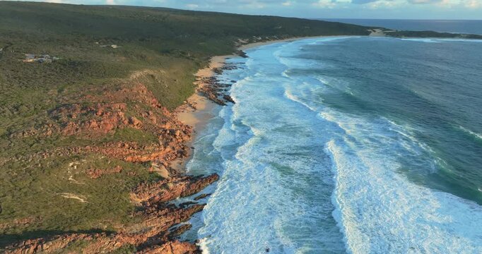 4k Aerial views of rugged rocky coastline in South West Australia at sunset