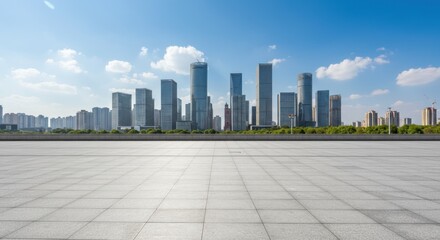 Panoramic view of a modern city skyline with tall skyscrapers under a bright blue sky.