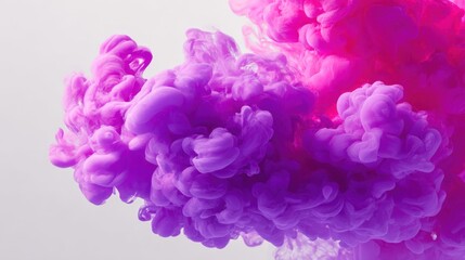 Fototapeta premium Colorful Smoke Plumes: Mesmerizing Abstract Art with Pink and Purple Ink in Water for Creative Backgrounds