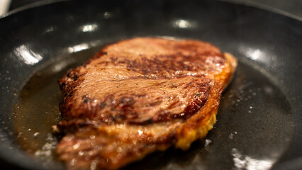 Juicy rare beef steak with perfect sear and appetizing pink center. Succulent meat showcase for gourmet photography, butchers, and premium restaurant marketing