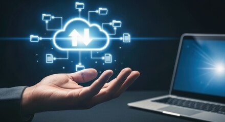 Cloud Technology Concept: Hand Holding Digital Cloud with Upload and Download Arrows, Laptop in Background