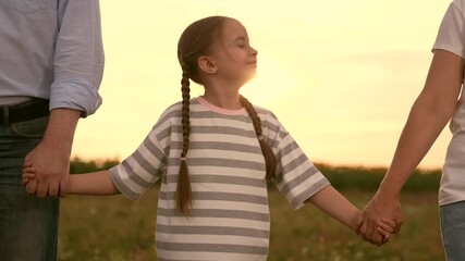 Family holding hands sunset, Happy child girl with parents outdoors, Childhood mother father happiness family, Togetherness love nature, Parents daughter enjoy evening, Smiling girl striped shirt