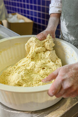 The process of making bread dough in a professional kitchen artisan craft concept