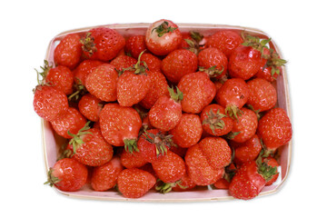 Top Down View Of Ripe Red Wild Strawberries In A Wooden Punnet Basket, Isolated On A White Background With A Light Shadow.
