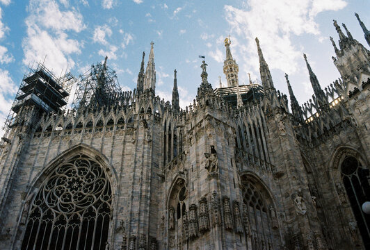 Milan Cathedral with scaffolding - Powered by Adobe