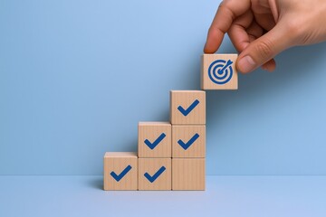 Achieving Goals: Hand Placing Target Block on Completed Checklist Blocks, Business Success and Development Concept