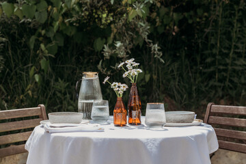 A table set up outside for outdoor dining.