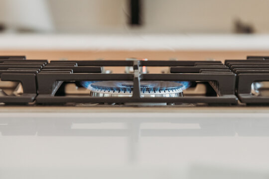 A gas stove ready for cooking.