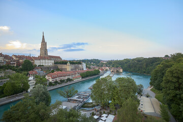 Naklejka premium Beautiful view of Bern's skyline with Aare River and historical buildings during twilight