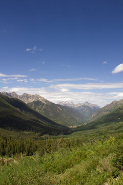 mountain landscape with blue sky and clouds
