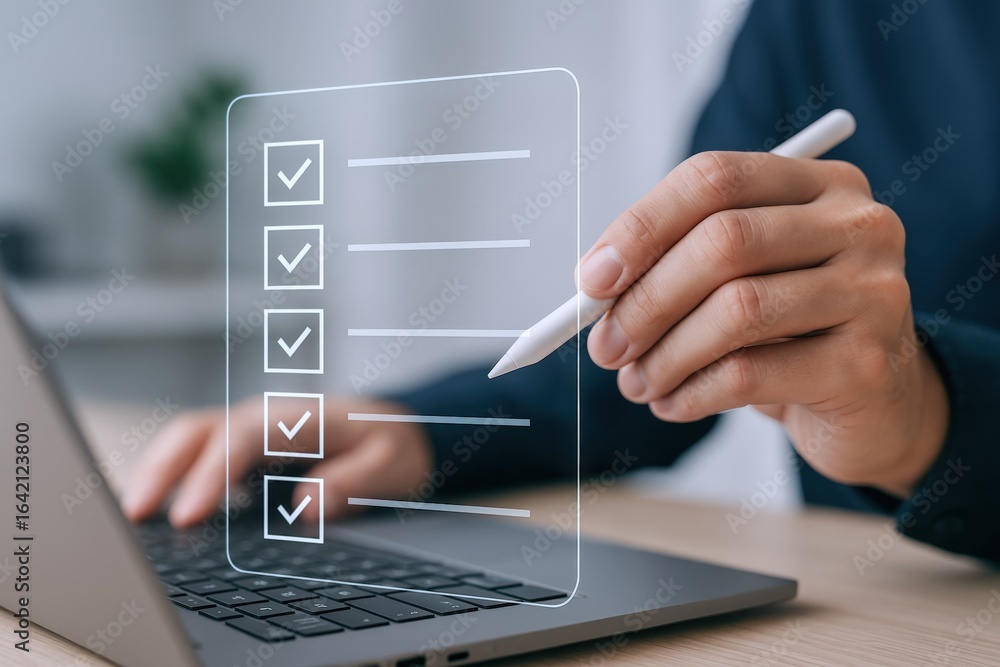 Poster digital checklist on screen: hand with stylus completing tasks on a laptop, close-up
