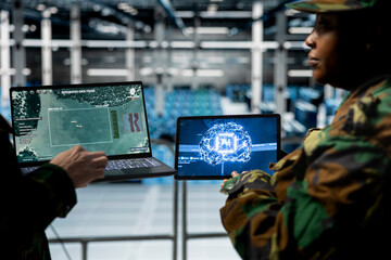 Army experts in data center deploying AI vision systems for missile pattern recognition. Military...
