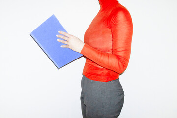 Person with formal business clothes reading yellow book work office 