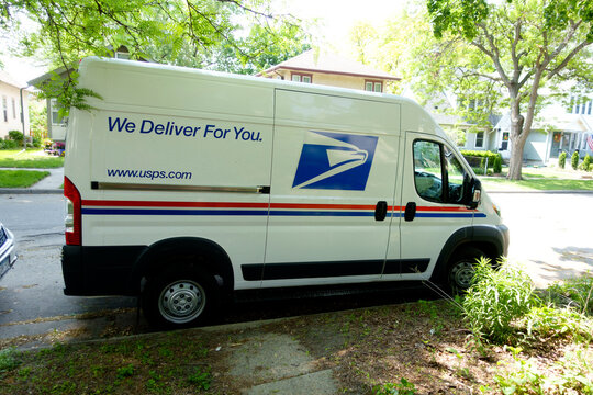 White neighborhood United States Postal Service mail delivery truck. St Paul Minnesota MN USA