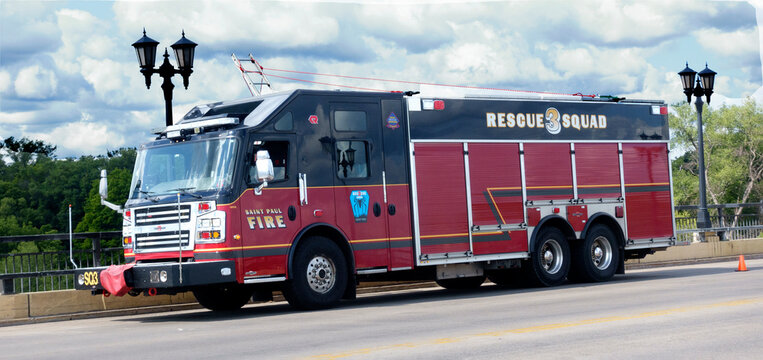 St Paul Fire Rescue Squad parked on the Lake Street-Marshall Ave. bridge over the Mississippi River. Hope it's practice! St Paul Minnesota MN USA